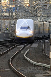 Shinkansen series E4 approaching Tokyo Station Asia