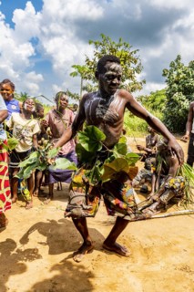 Pygmy man dancing