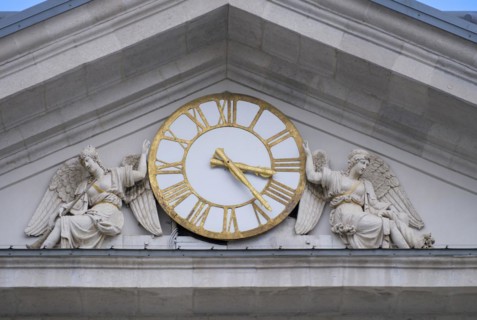 Clock above the portal of the Palazzo della Borsa Vecchia