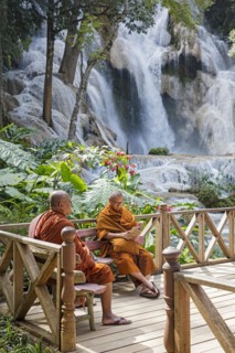 Two Buddhist monks at the Kuang Si Falls
