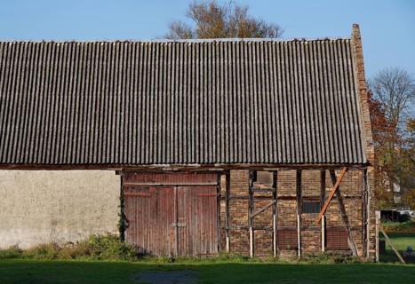 Still unrenovated historic barn in the barn district of Kremmen
