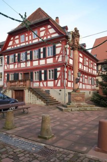 Market square with half-timbered house and fountain