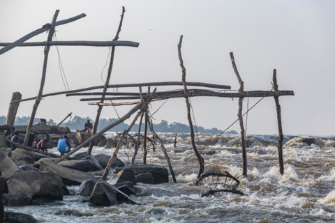 Wooden tripods with baskets attached