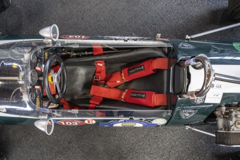 Top view of a retro racing car with bucket seat