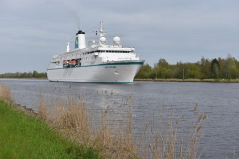 Cruise ship Deutschland sails from Kiel to Brunsbuettel in the Kiel Canal