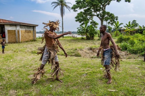 Wagenya tribal men practising wrestling