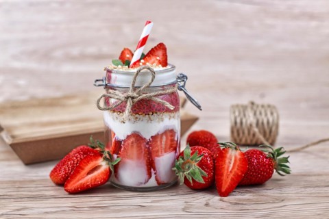 Strawberry fruit dessert with low fat yogurt