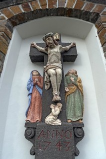 Religious sculptures in a niche