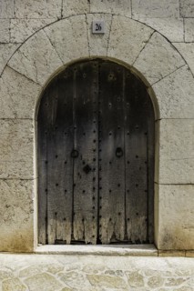 Old wooden door in wall