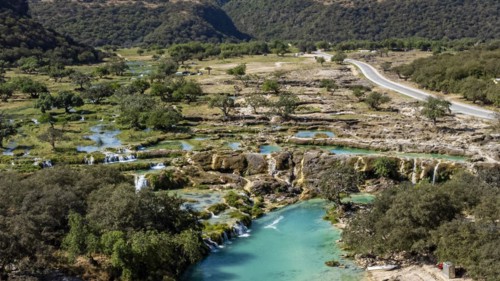 Aerial of turquoise waterfalls