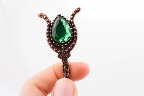 Hand holding a Retro styled teaspoon