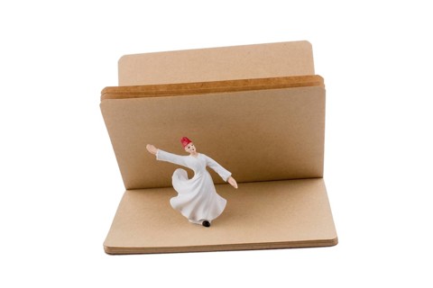 Sufi Dervish on a notebook on white background