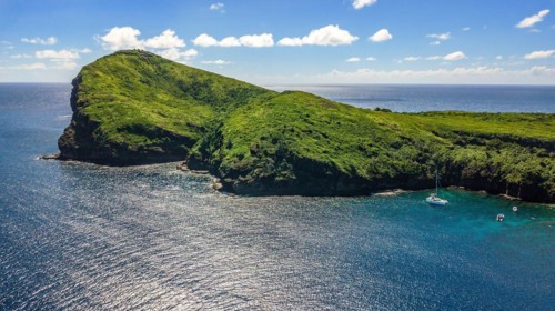 Aerial view of bird's eye view on western part of Isle de Coin de Mire Gunner's Coin Island off north coast of Mauritius in Indian Ocean