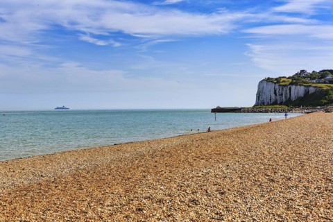 Shingle beach with chalk cliffs