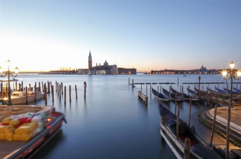 Moored gondolas at the Bacino di San Marco with the church of San Giorgio Maggiore