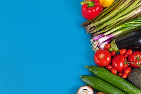 Healthy vegetables background with tomatoes