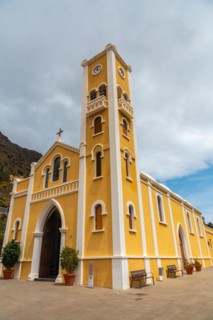 Lovely yellow church of La Encarnacion in the village of Hermigua in the north of La Gomera