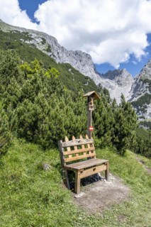 Bench and wayside shrine