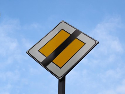 End of priority road sign