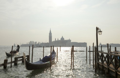 Moored gondolas at the Bacino di San Marco with the church of San Giorgio Maggiore