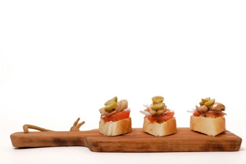 Slice of bread with mackerel with red peppers