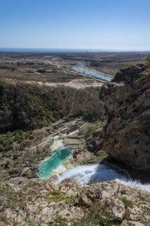 Huge waterfall with turquoise rockpools