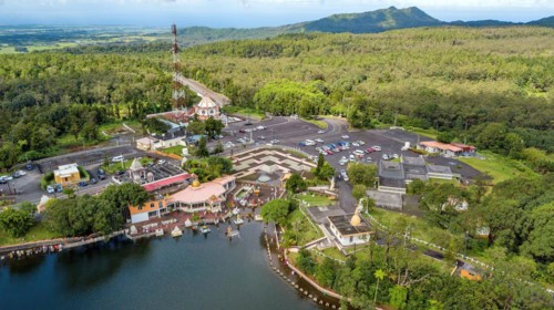 Bird's eye view of aerial view of temple Temple complex for Hindi worshippers of largest Hindu sanctuary outside India at Holy Lake Ganga Talao