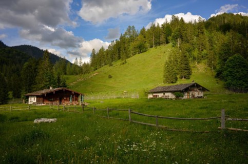 Idyllically situated alpine huts of the Schwarzachenalm near Ruhpolding
