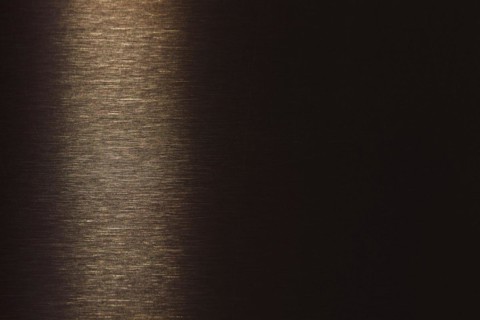 Metallic brushed background bronze colour with gradient into brown golden