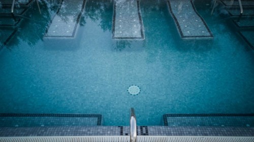 Swimming pool in a hotel with a relaxation zone