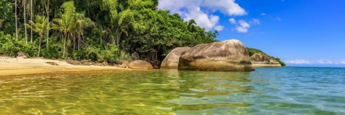 Panoramic image of a deserted and paradisiacal beach on Ilha Grande on the green coast in the south of the state of Rio de Janeiro