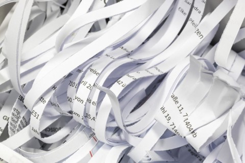 Paper strip documents made unrecognisable in the shredder