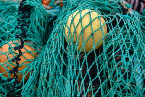 Fishing nets and buoys in the harbour of Guilvinec