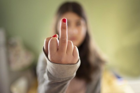 Topic: Girl shows middle finger in protest