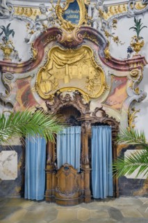 Richly carved confessional
