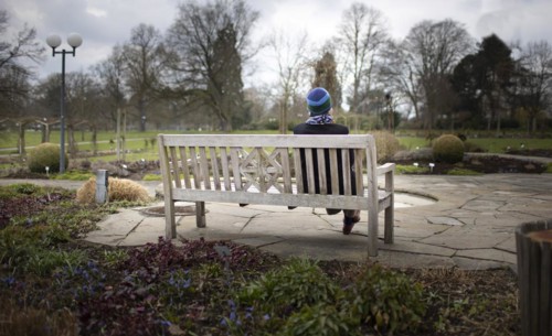 Subject: Pensioner on a park bench in Westfalenpark in Dortmund