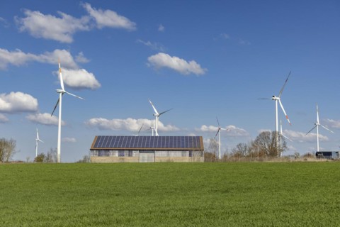 Solar modules on a stable and wind turbines in Brandenburg