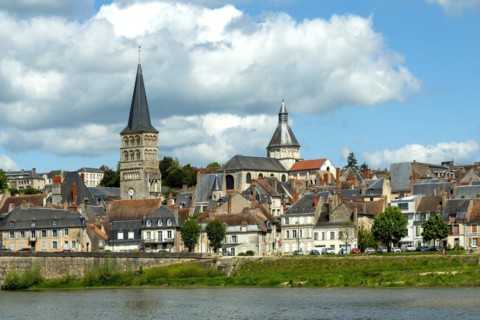 La Charite sur Loire. View on the Sainte-Croix bell tower and the Notre-Dame church. Nievre department. Bourgogne franche Comte. France