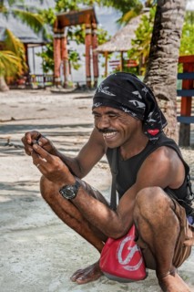 Divemaster from Papua-Diving on Arborek Island in the Dampier Strait