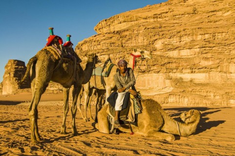 Friendly Bedouin with his camels