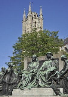 Monument in honour of the Van Eyck brothers and the Saint Bavo cathedral in Ghent