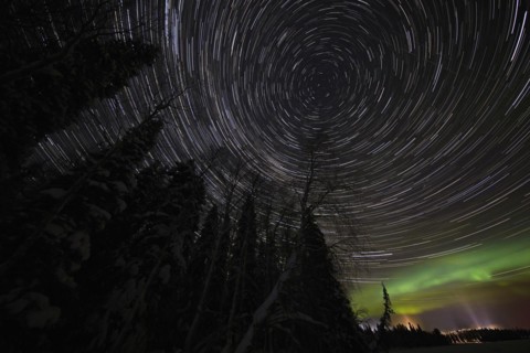 Star trails with some Northern Lights at Lake Pyhaejaervi