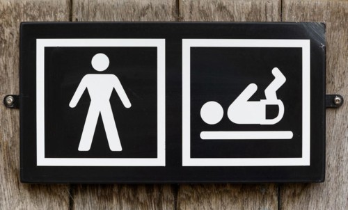 Male toilet sign with baby nappy diaper changing facility