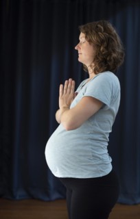 Pregnant woman doing yoga