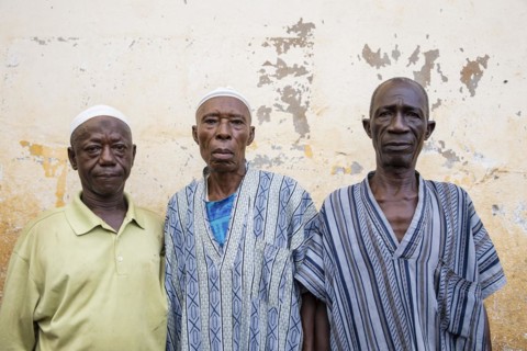Three men in Bomeh Village at the KissyRoad dumpsite