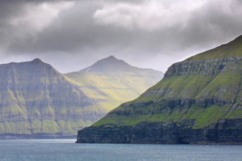 Sea cliffs along the rugged coast of Eysturoy