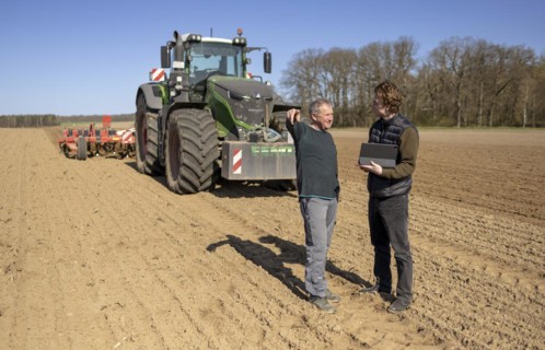 Soil cultivation for maize sowing with tractor Fendt 1050