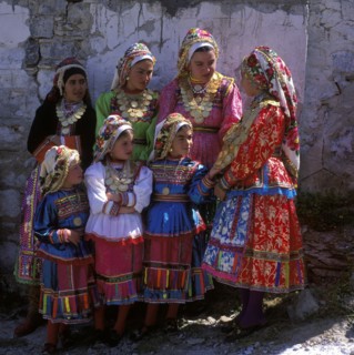 Girls decorated with gold coins