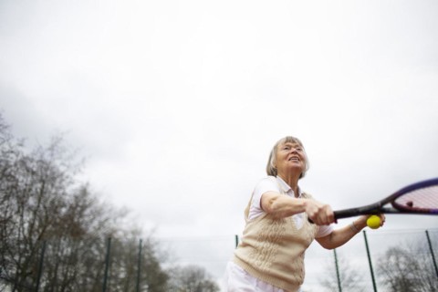 Subject: Woman aged 82 standing on the tennis court