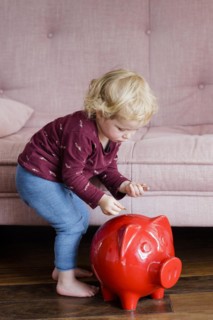 Child with piggy bank